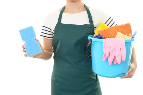Commercial cleaning team working in a Merton office reception area