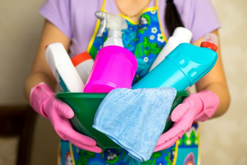 Office cleaner working in a Merton business reception area