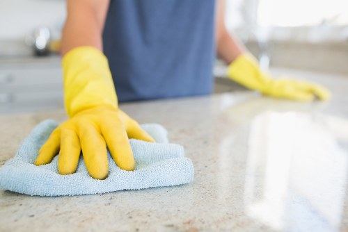 Odour treatment for upholstery and carpets in a Merton living space